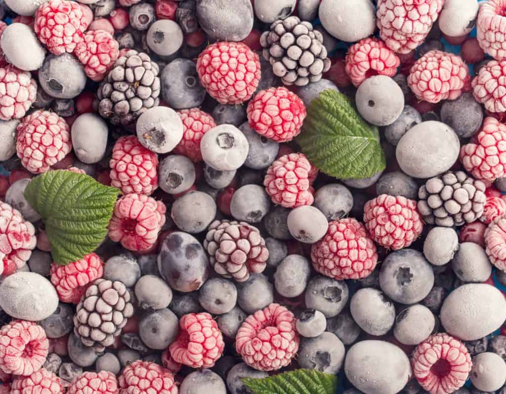 Assorted frozen berries background