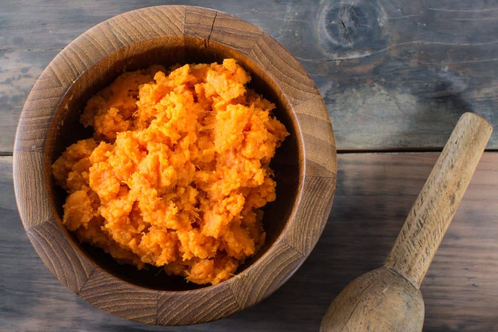 bowl of orange mashed sweet potato 