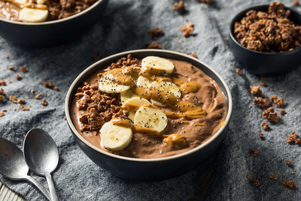 Homemade Chocolate Chunky Monkey Smoothie Bowl with Banana and Peanut Butter