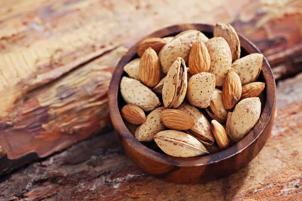 bowl full of raw almonds 