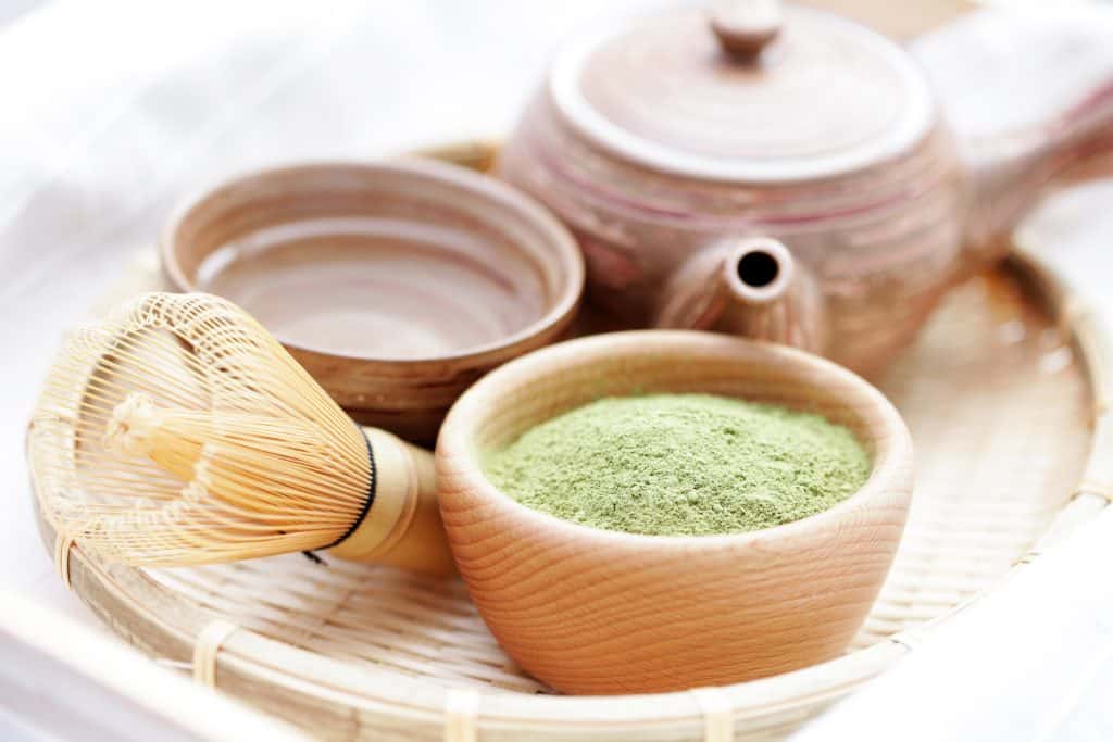 green powder tea with bamboo whisk 