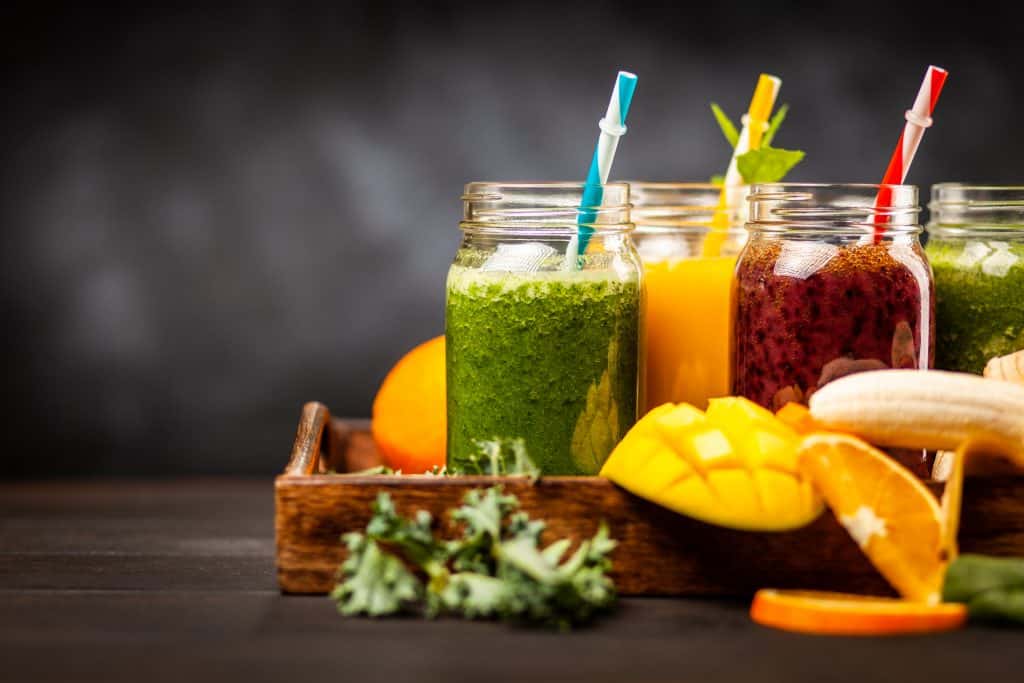 Assortment of green detox and fruit smoothies that can be used for meal replacements