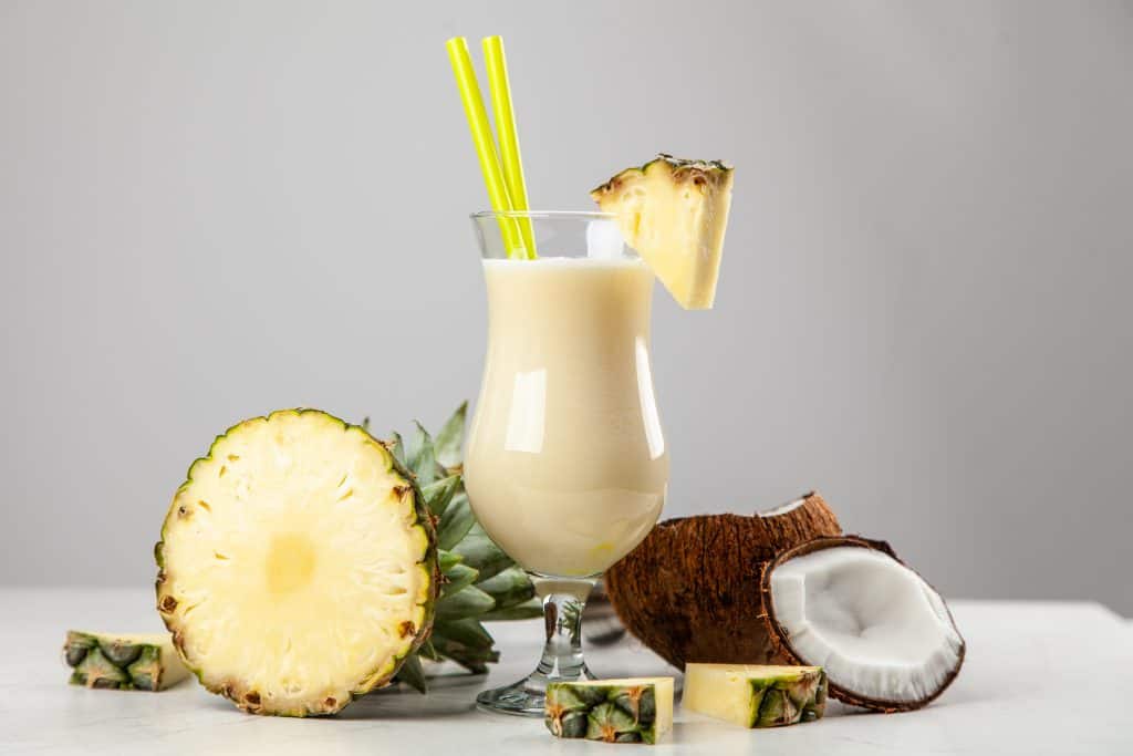 pina colada silken tofu smoothie on gray background