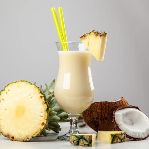 Pina Colada Cocktail on neutral background