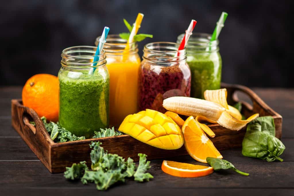 Assortment of green detox and fruit smoothies
