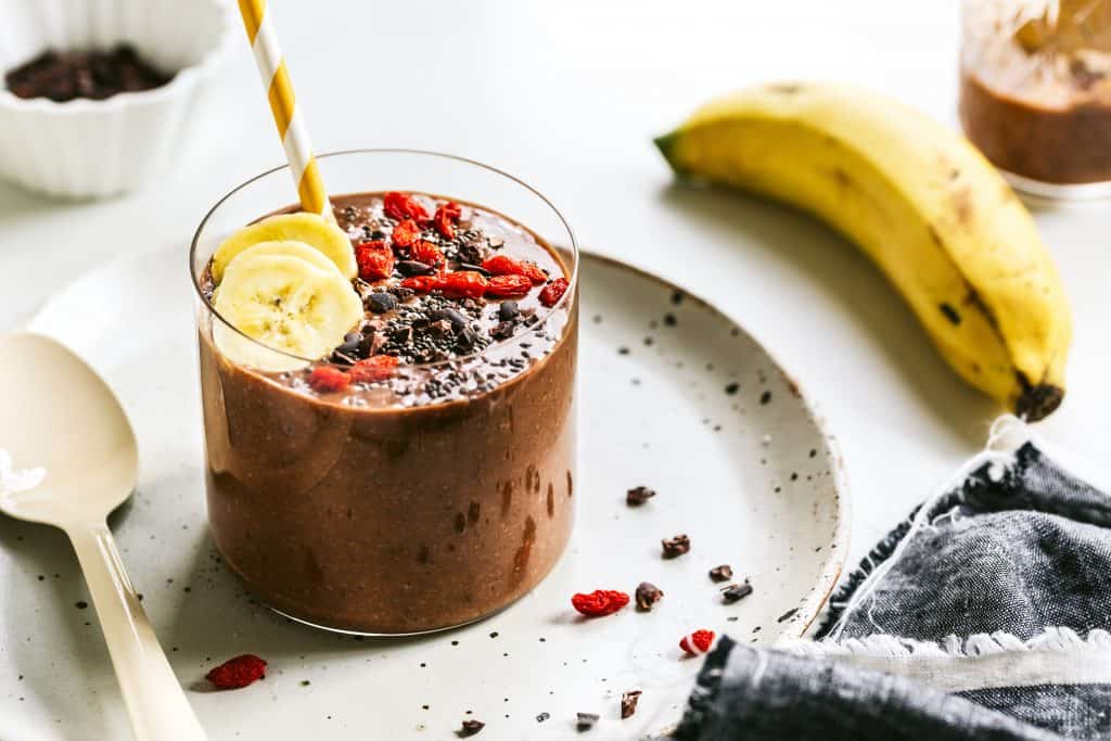 Banana,Coconut water, Chia seed and Cacao Smoothie with Goji and Cacao nib topping